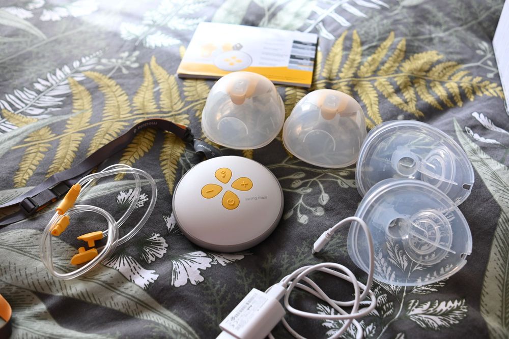Двуфазна електрическа помпа за кърма Medela Swing Maxi Hands Free