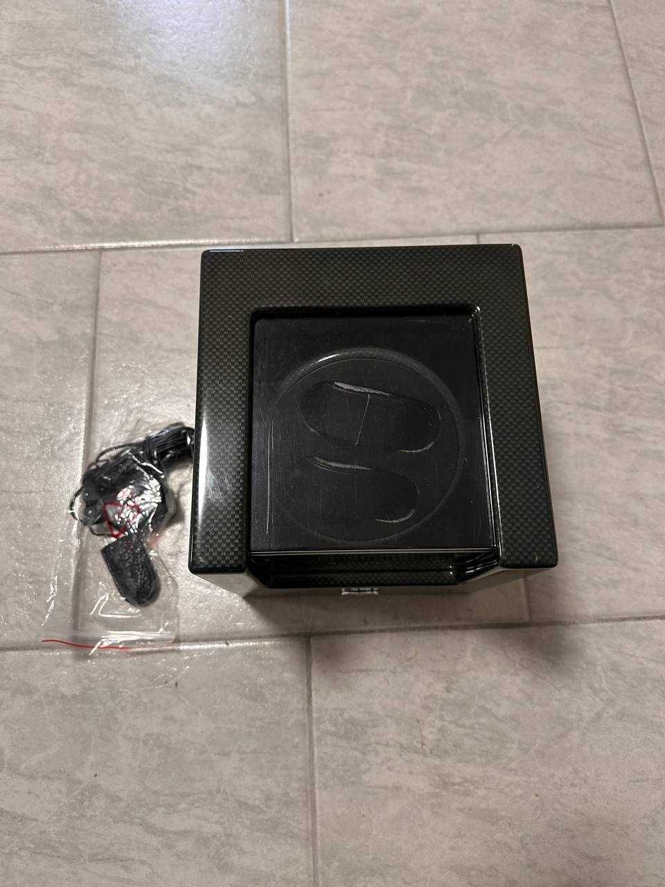Dispozitiv pentru întors ceasuri