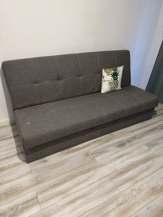 Canapea gri extensibilă – stare foarte bună