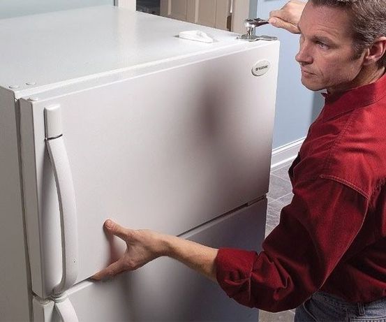 перенос дверцы холодильника