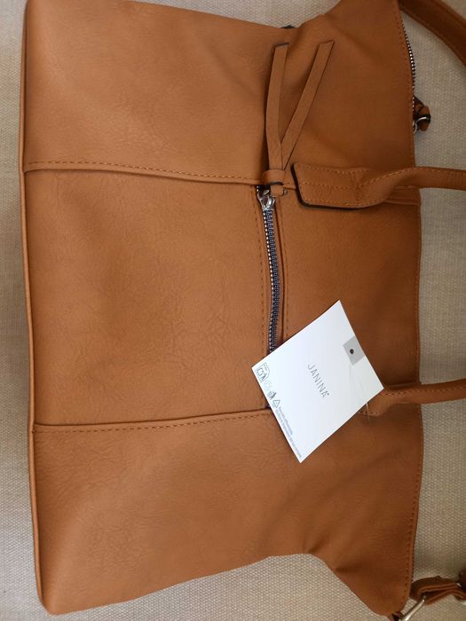 Качественную немецкую сумку, новую, продам