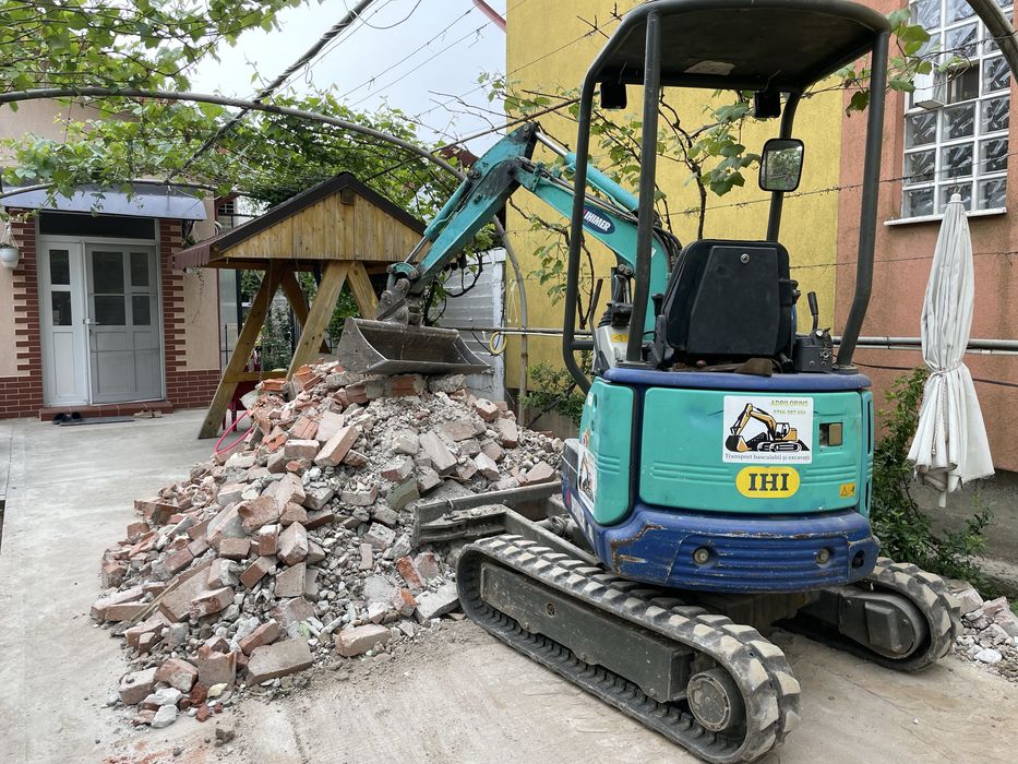 Incarcare evacuare moluz, transport basculabil miniexcavator