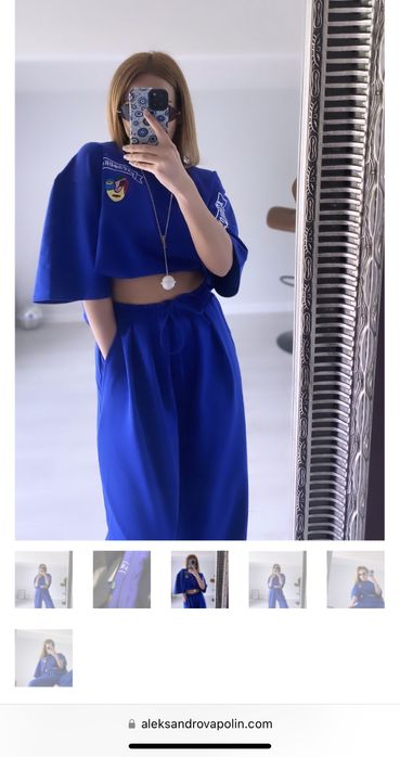 Дамски тъмно син панталон със широки крачоли.