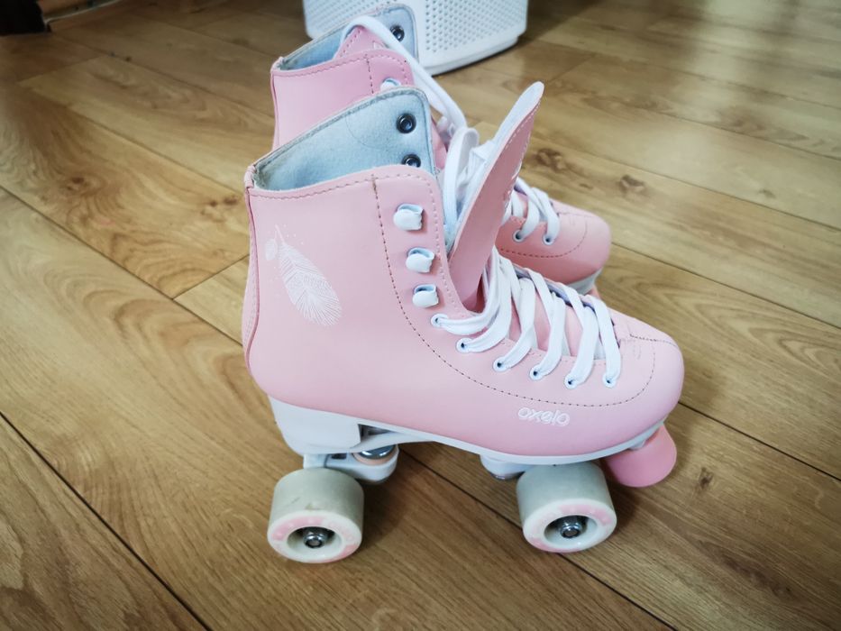 Patine cu rotile Oxelo roz