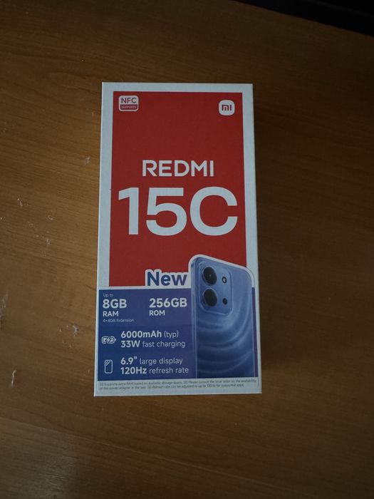 Vand telefon Redmi 15C.