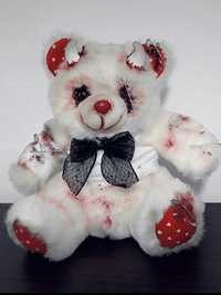original teddy bear in a terrifying style, with a black bow.