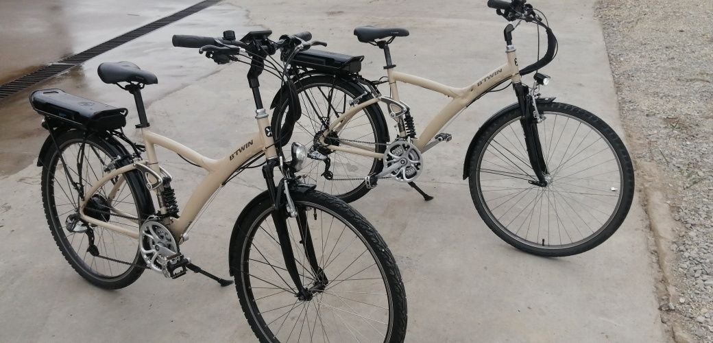 Bicicleta electrică BTWIN, roți de 28, suspensii, ca nouă