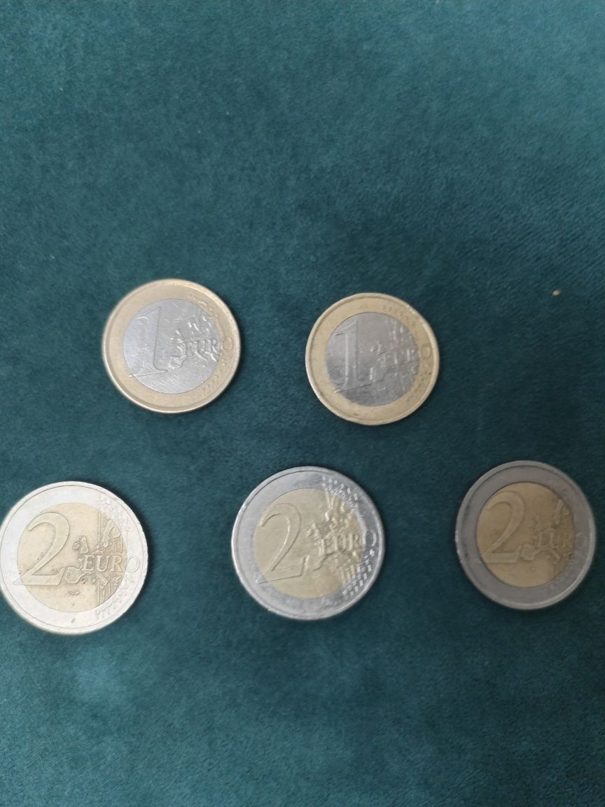 Monede 1 € și 2 €.