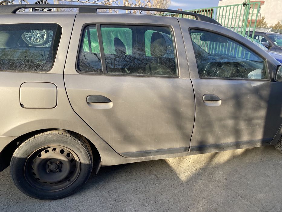 Aripă dreapta spate Dacia Logan MCV 2014