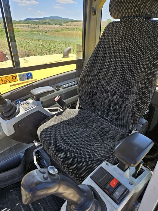 Excavator pe roti Neuson rototilt