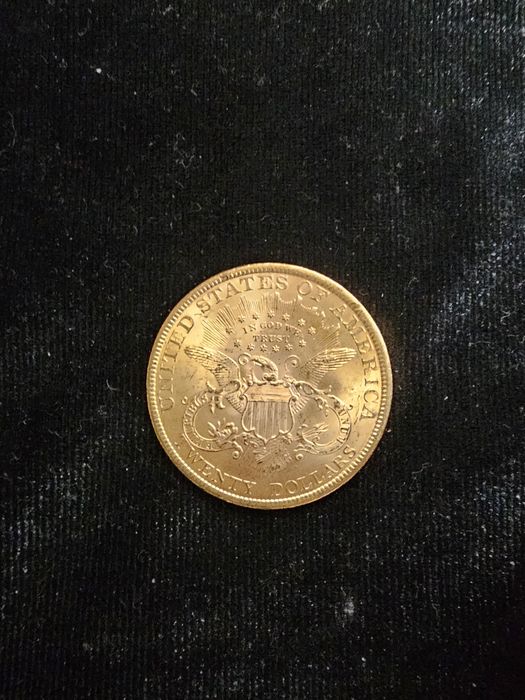 Златна монета 20 американски долара.