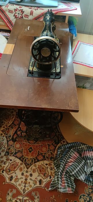 Mașina de cusut Singer