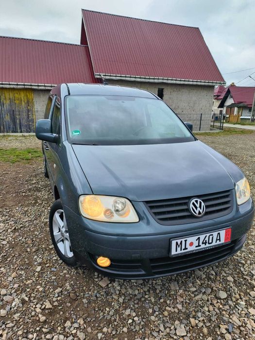 wv caddy 2.0 tdi 7 locuri