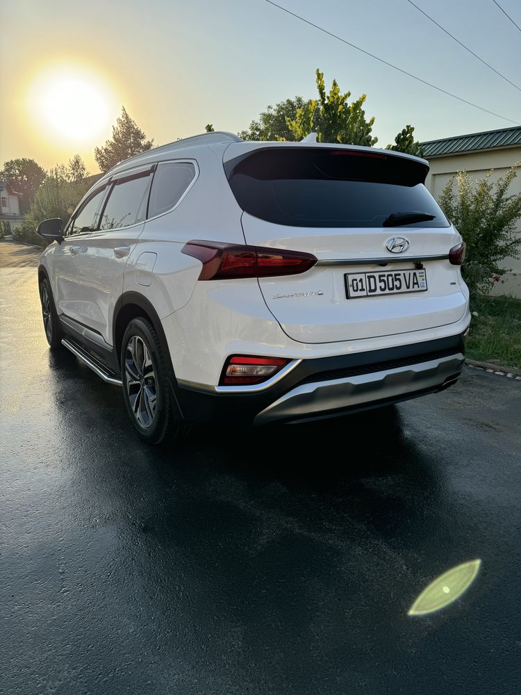 Продам свою Hyudai Santa FE 2.4 AT 4WD Premier 7 мест