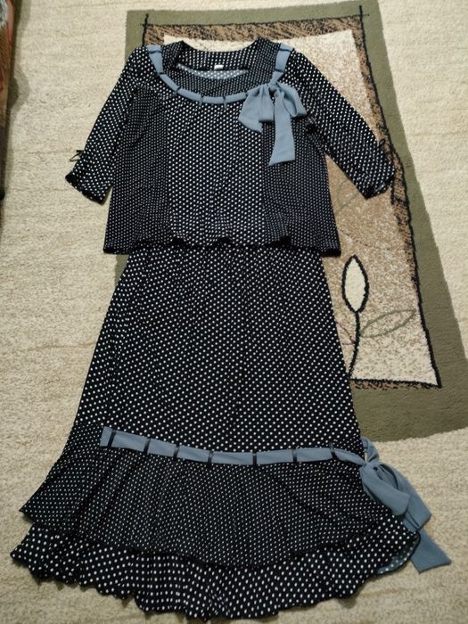 Продам женский костюм 58 размера