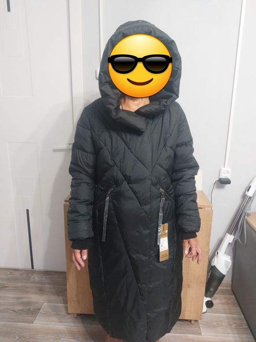 Продаеться новый женский пуховик.