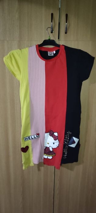Tricou desigual 9-10 ani