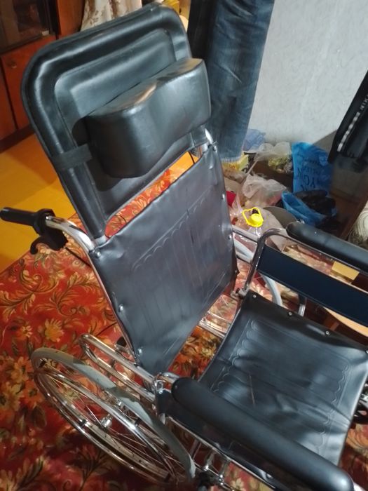 Инвалидная коляска.