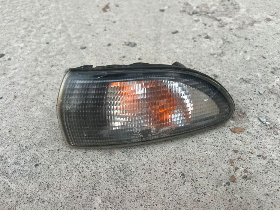 поворотник левый галант дутый