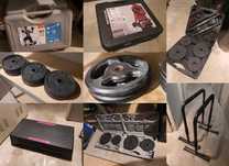 Echipamente fitness (gantere, discuri, bare paralele, stepper)
