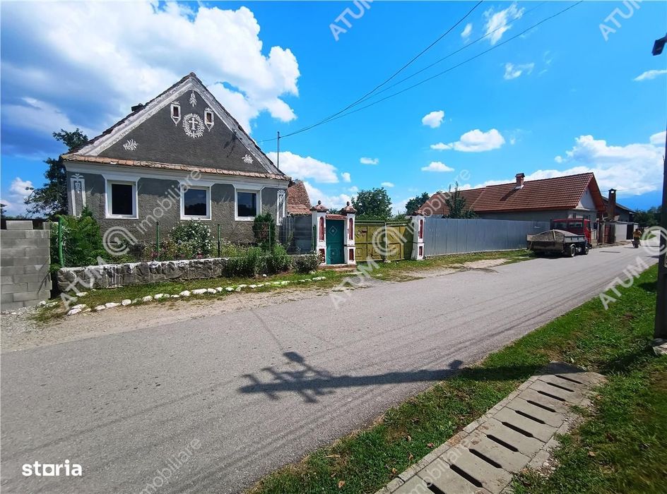 Casa cu 4 camere si 1650 mp teren la doar 30 km distanta de Sibiu
