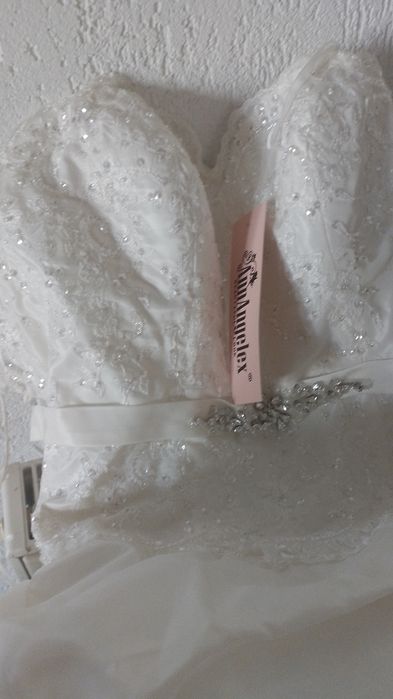 Vand doua rochii de mireasa  noi marimea 40-42