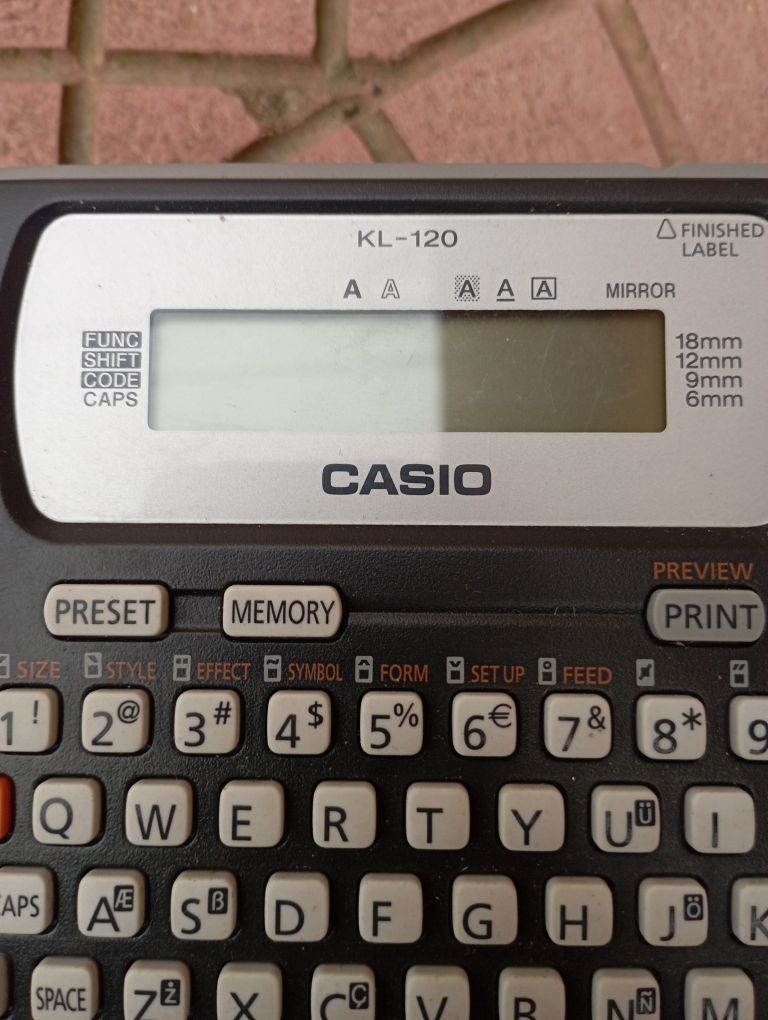 Принтер за етикети Casio