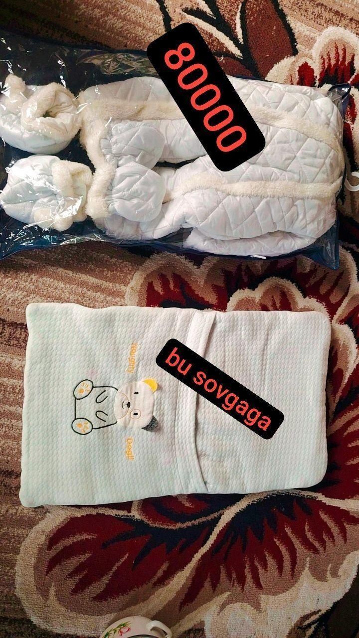 Bolalar kurtkasi qalin ko'p kiyilmagan kim olsa yonidagi sovgaga
