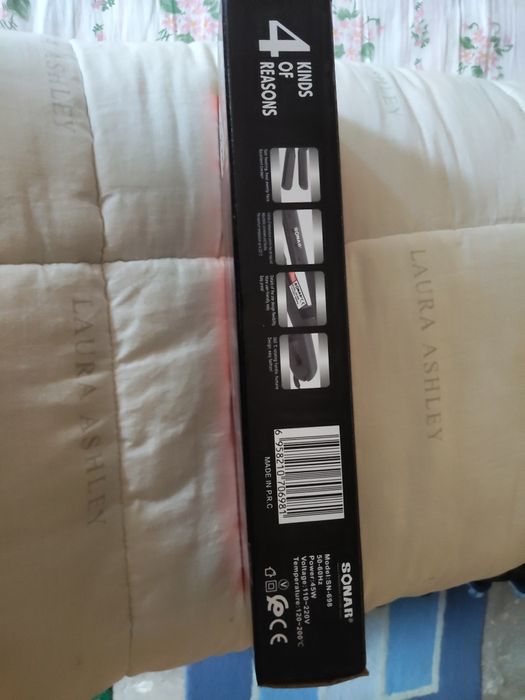 Преса за изправяне на коса