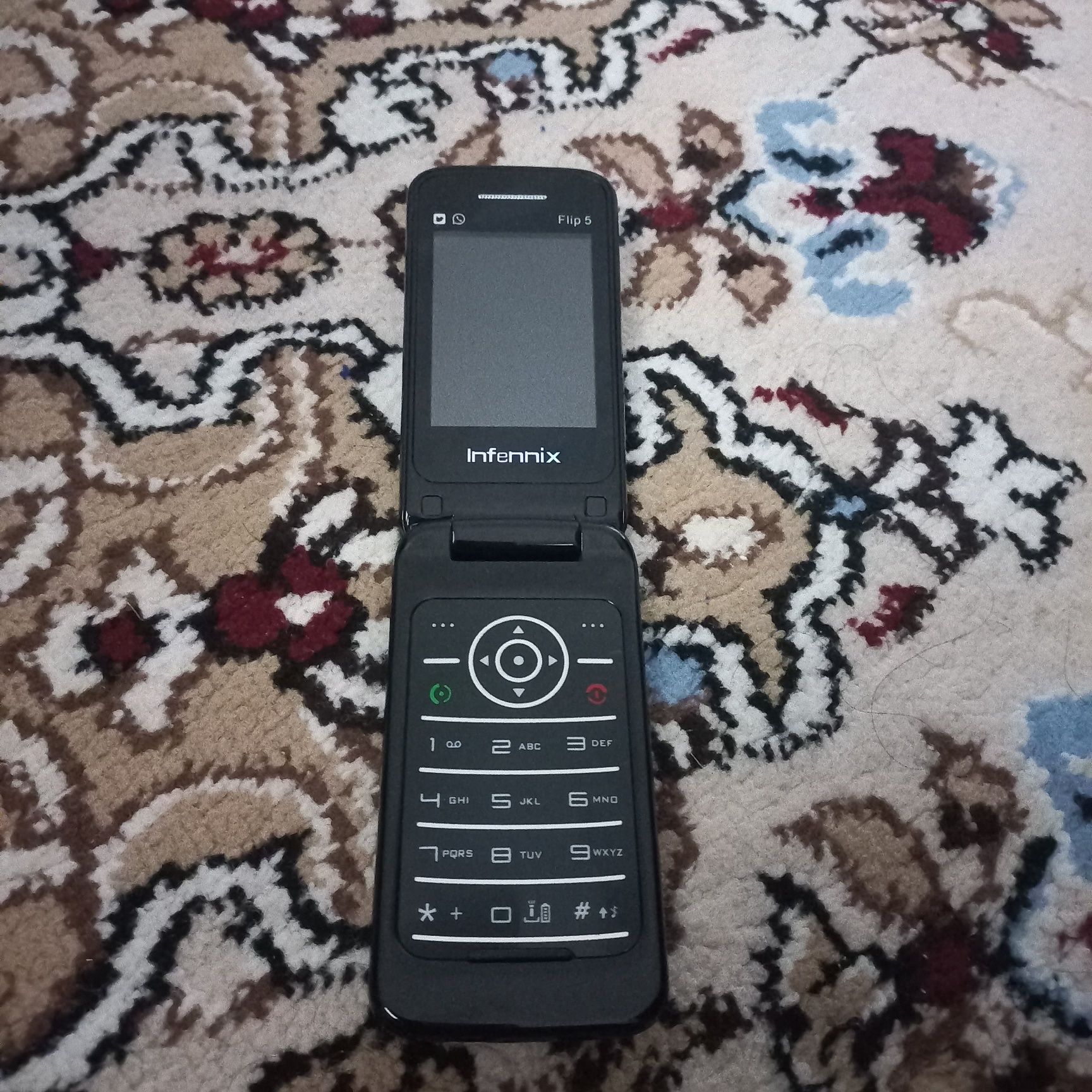 Knopka    Infennix flip 5