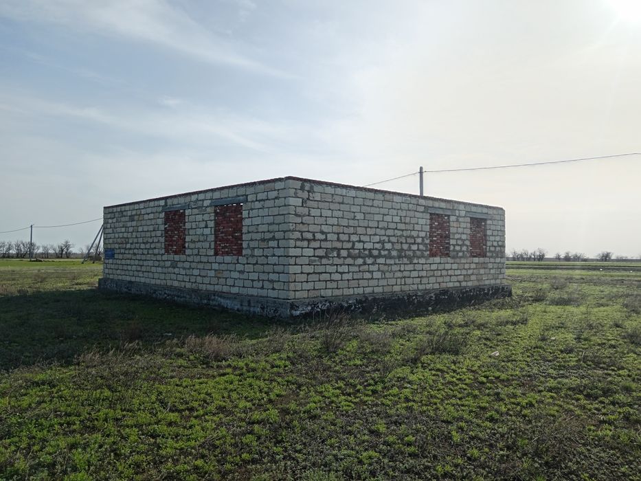 Земельный участок с недостройным домом