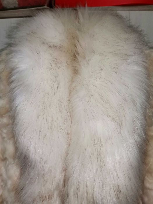 Vesta de blana, puf