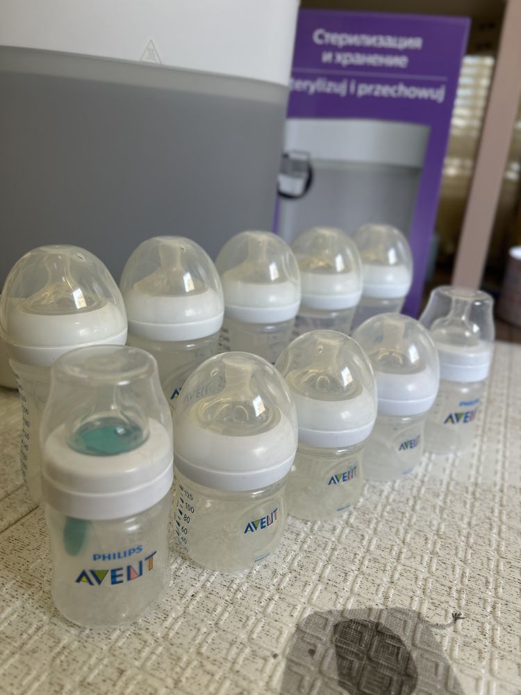 Стерилизатор и 10 шишета Avent + 16 биберона