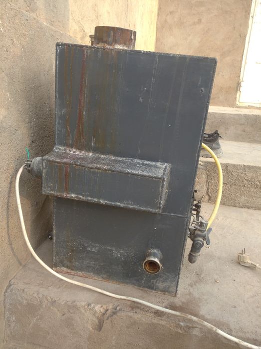 Печь очень хороший . Самодельные.с электрическим тентомс газовыйшланго