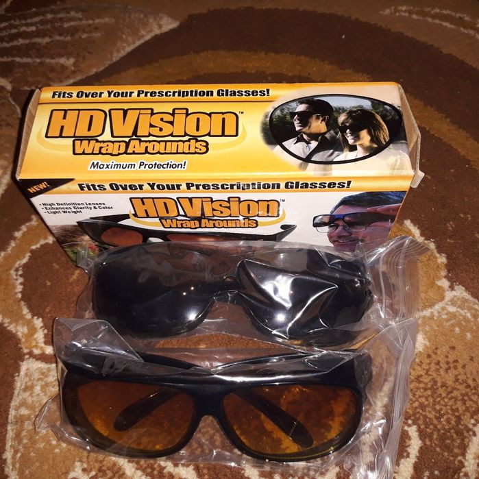 Vând  ochelari HD Vision de condus pe timp de noapte si timp de zi