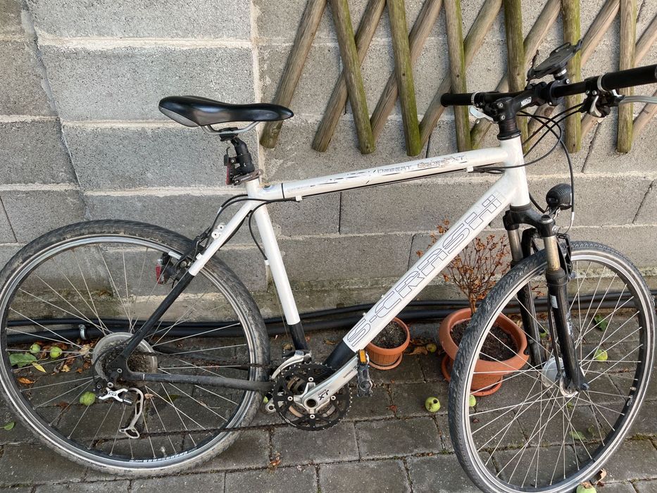 Bicicleta trekking barbati Shimano XT si bicicleta dama Nishiki Hybrid