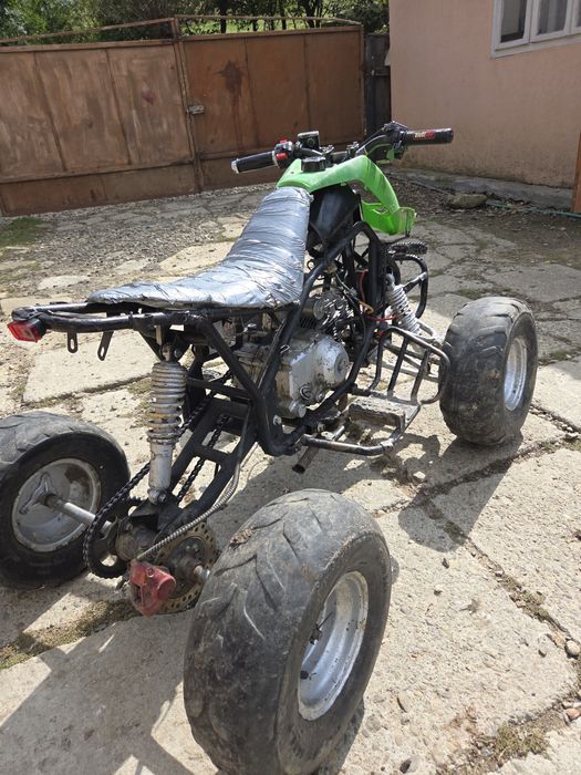 Vand atv 125cc merge impecabil