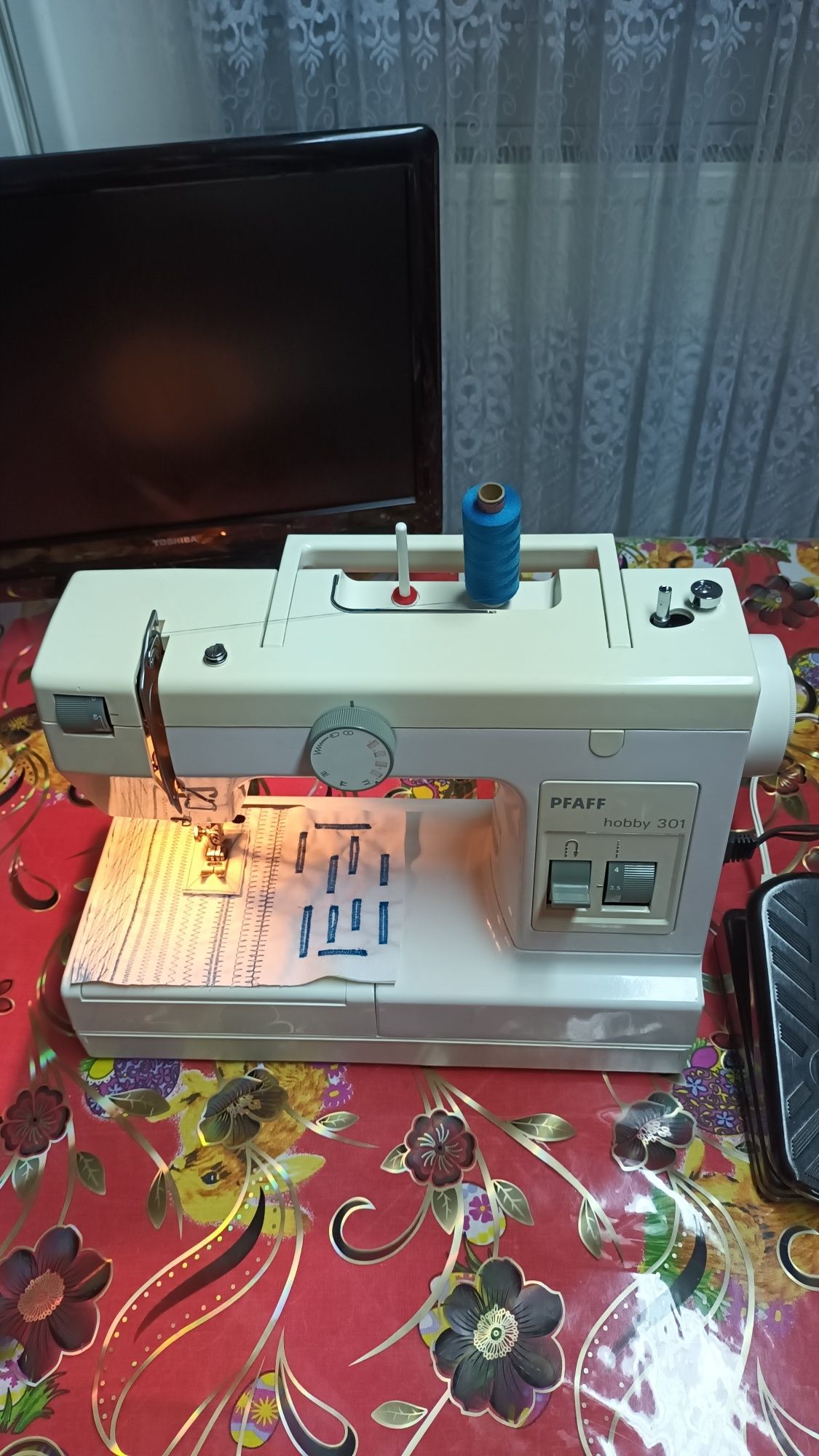 Masina de cusut PFAFF HOBBY cu butoniera automata si multiple operații