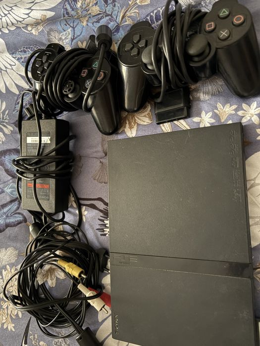 Vand Playstation 2 complet!