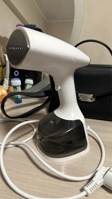 Отпариватель, паровой утюг