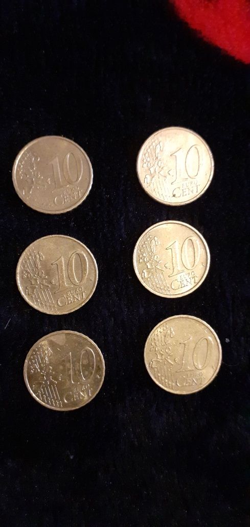 Monede de 20 euro cent și altele.