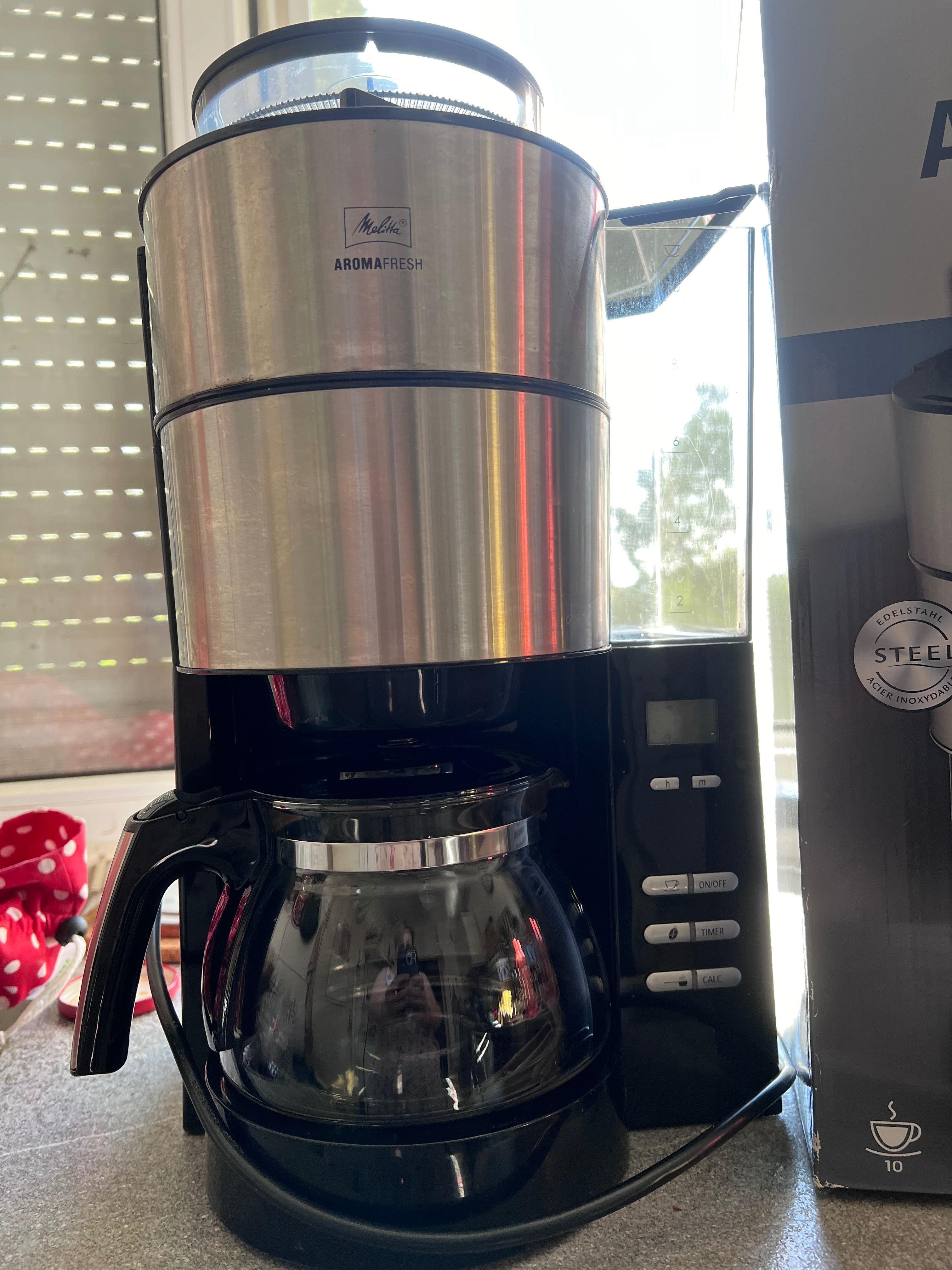 Cafetiera Melitta cu rasnita si timer