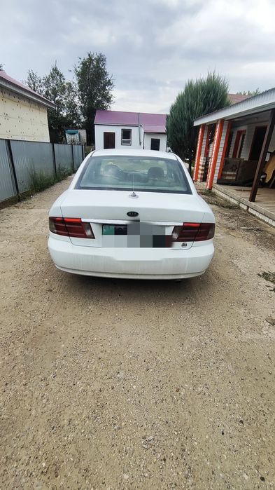 Машина Kia Optima 2002