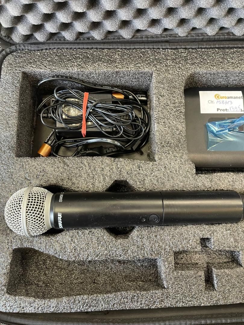 Sistem wireless Shure BLX4/ M17 cu microfon de mana SM58 -A-