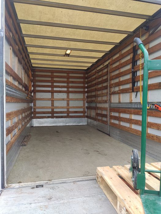 Транспортни услуги с камион с падащ борд