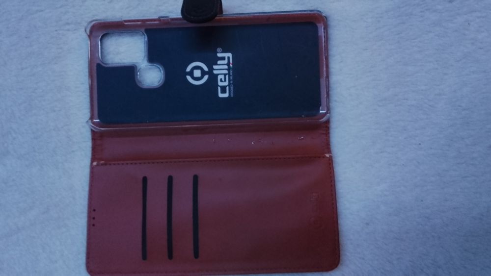 Husa telfon celly wally pentru a21s sau alte telefoane. Asemănătoare