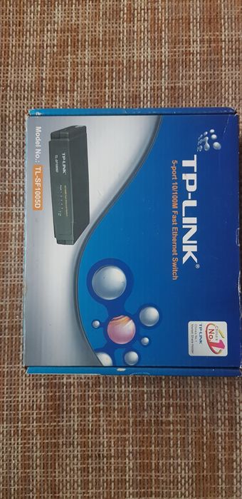 Vând TP LINK TL-SF1005D switch distribuitor nou, nefolosit, nescos din