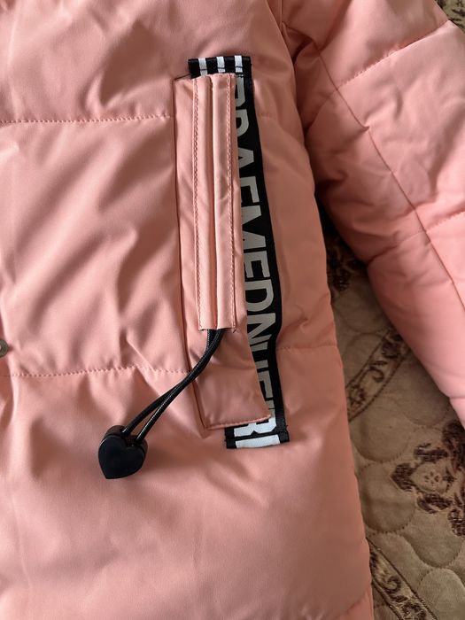 Продам новую зимнию куртку р.134