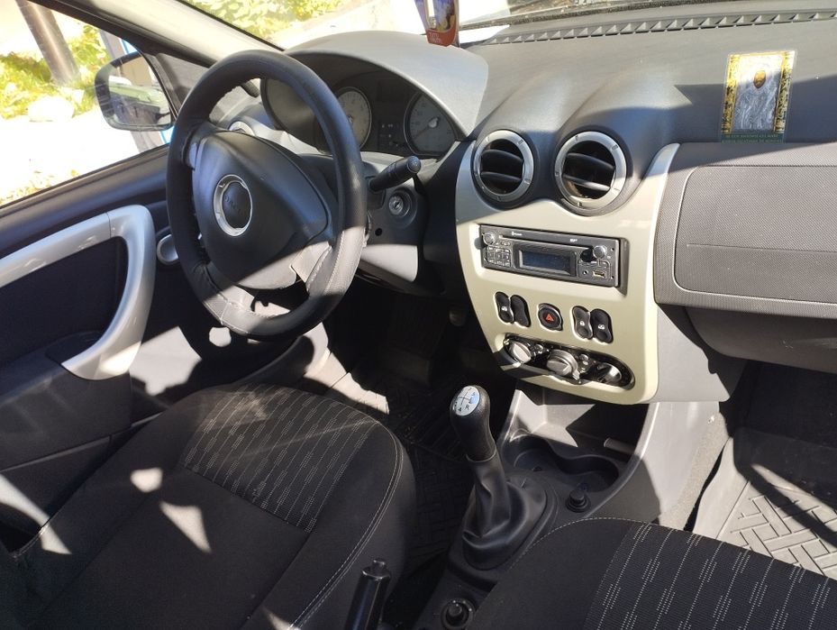 Dacia Logan An 2012 luna a 11