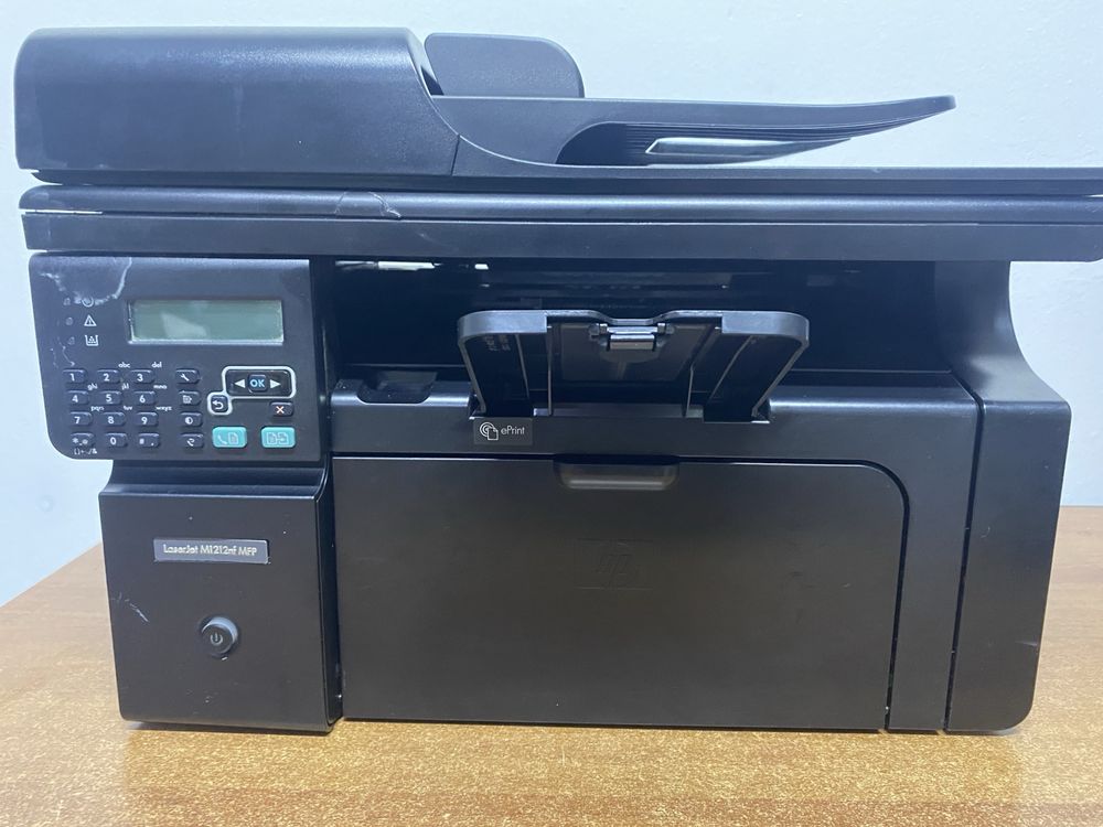 Multifunctionala HP M1212nf